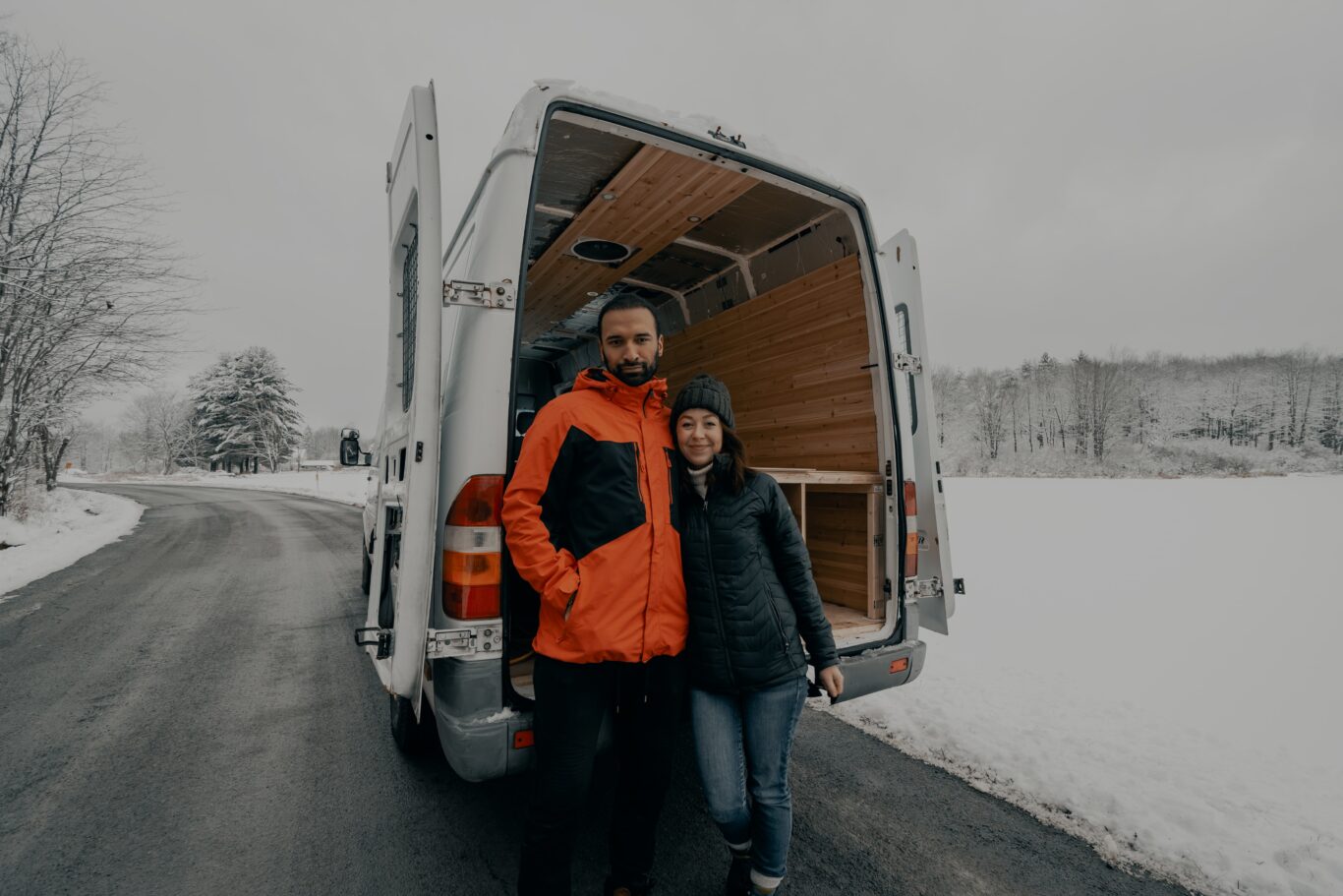 Couple RVing in the Snow