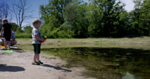 fishing on the Clam River at Camp Cadillac